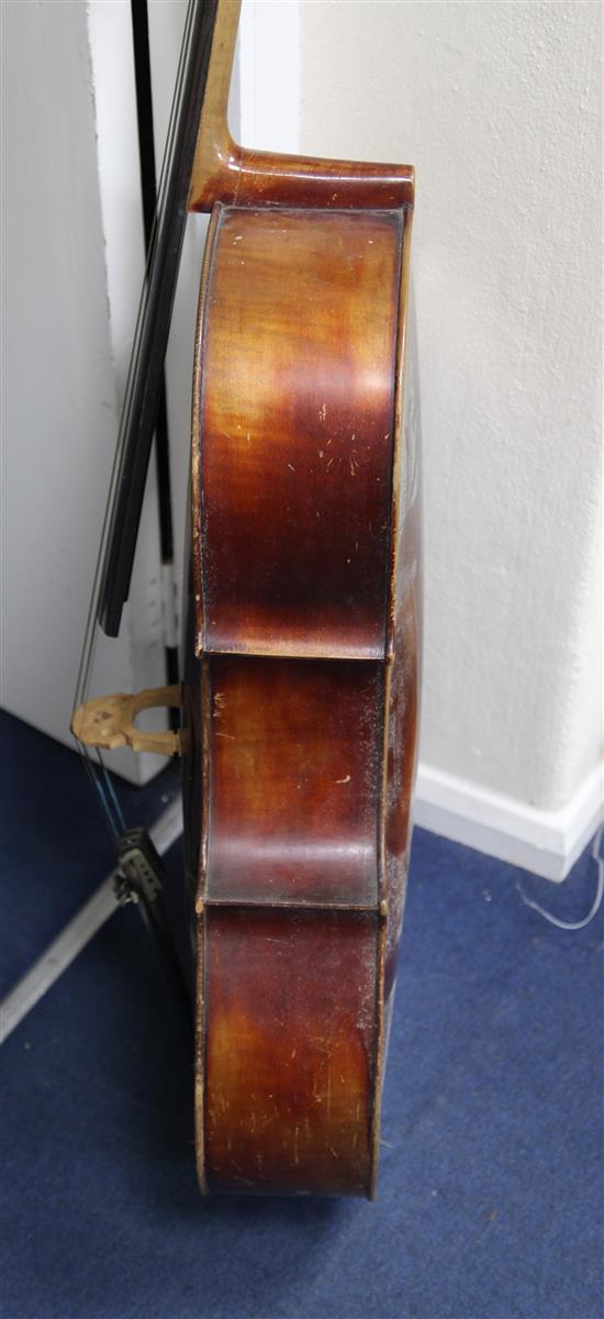 An early 20th century cello, probably French, body 29.5in., length overall 49in.